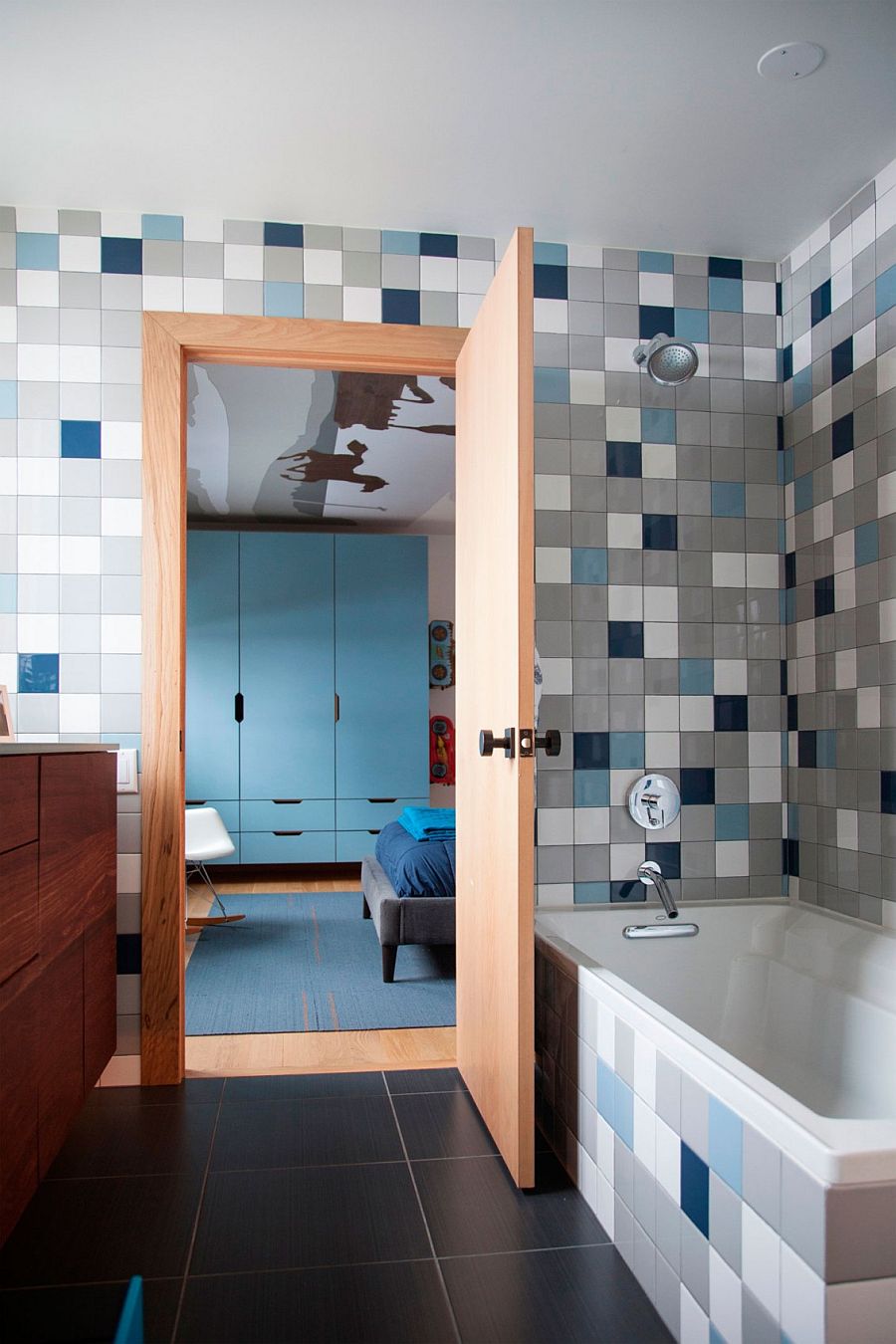 Colorful and eclectic collection of tiles inside the modern bathroom