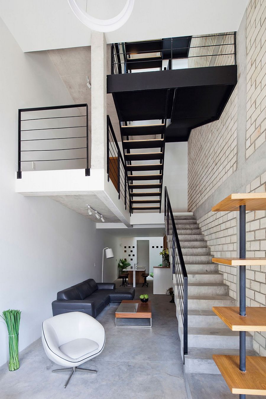 Contemporary and industrial styles come together at the 4-story Vietnam house