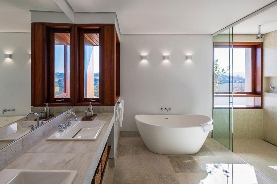 Contemporary bathroom with standalone bathtub in white