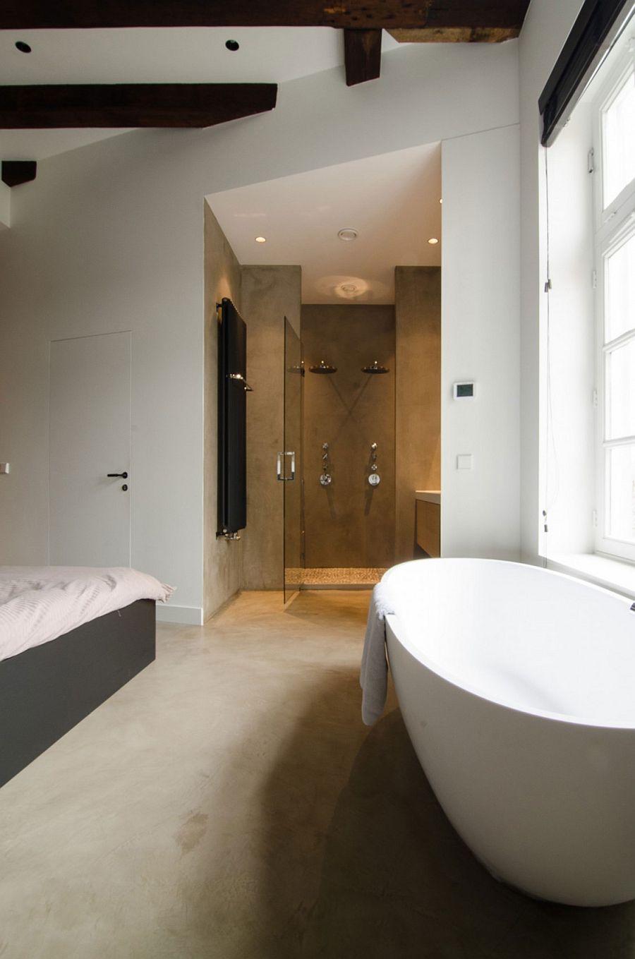 Corner shower area in the master bedroom with bathtub