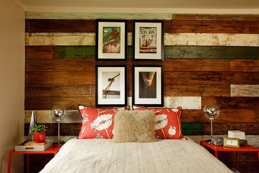 Cozy beach style bedroom with a striking accent wall in wood [Design: Garrison Hullinger Interior Design]