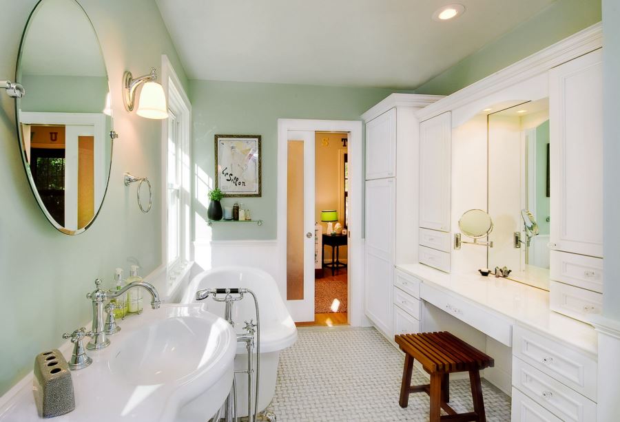 Crisp white bathroom with mint walls