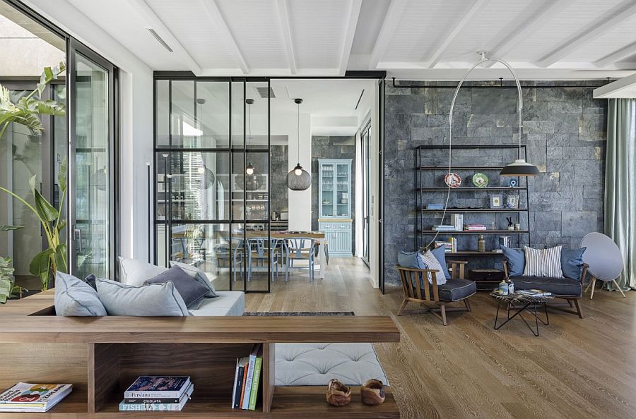 Custom couch and bookshelves add to the uniquness of the Y House in Turkey