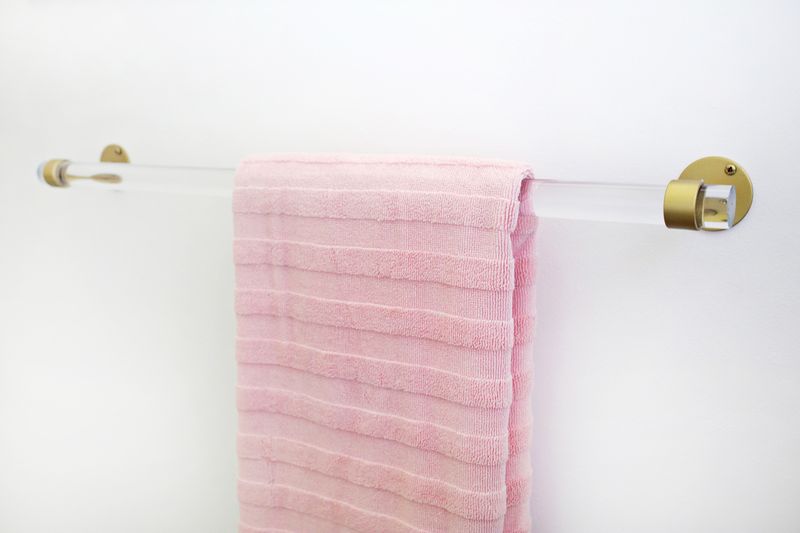 DIY Lucite towel rack from A Beautiful Mess