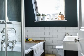 Darker shades of gray can replace black in smaller bathrooms