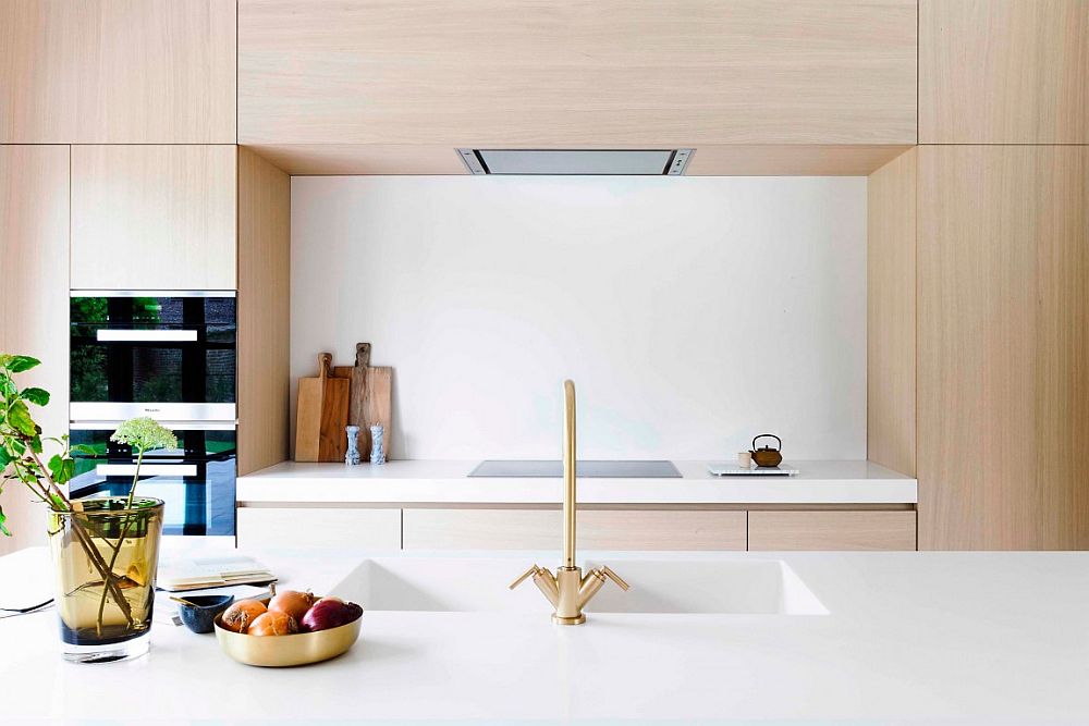 Design of the kitchen cabinets extend the living area visually