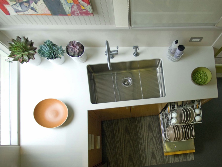 Dishwasher filled with dishes in a modern kitchen