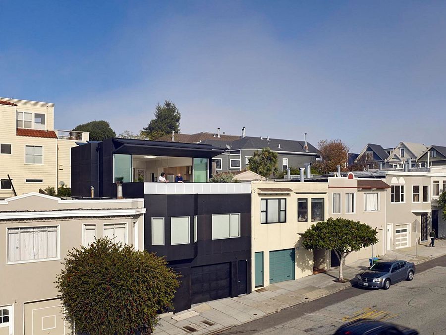 Distinctive and dark street facade of 20th St House in San Francisco