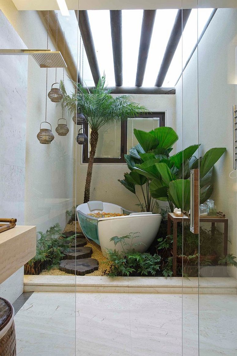 Embracing your love for greenery with a vivacious, plant-filled bathroom [Design: Eduarda Correa Arquitetura & Interiores]