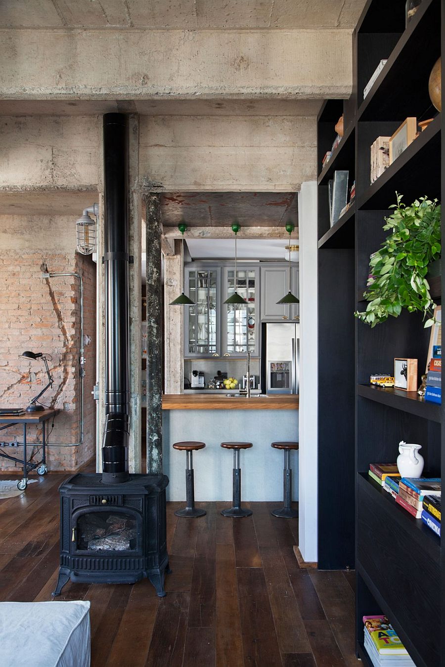 Exposed duct work, pipes and brick walls give the interior a distinct industrial appeal