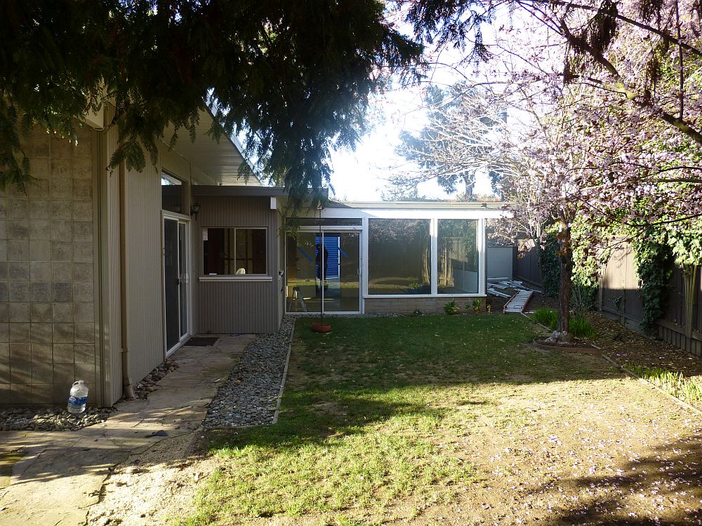 Exterior of the mid century home before the renovation