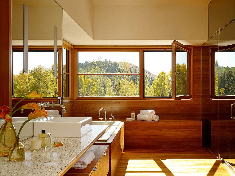 Fabulous wooden window seat adds to the opulence of the modern bathroom