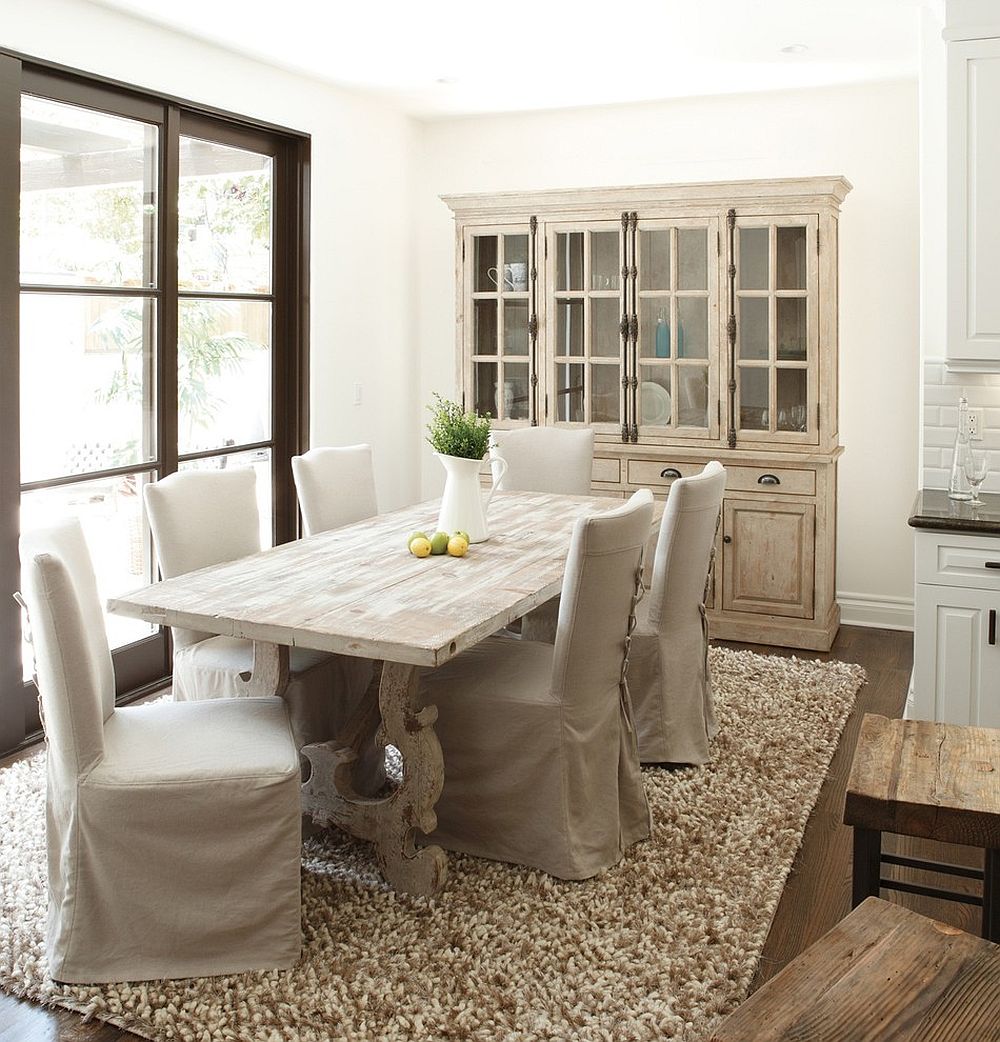 French country style dining room with a stylish hutch and dining table in wood