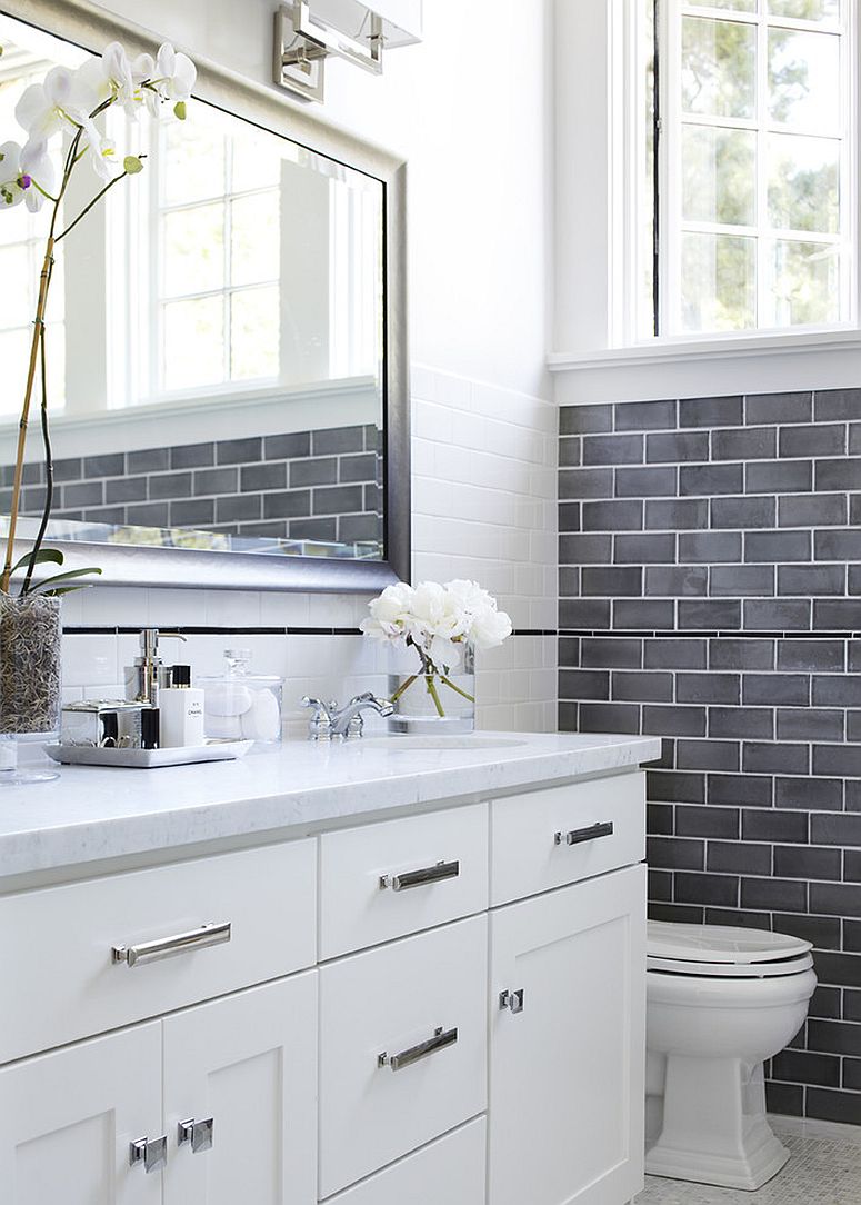 Give the pristine white bathroom a cool gray accent wall