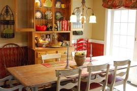 Goregous hutch creates a cool and colorful backdrop in this farmhouse style dining space 270x180 Organizational Delight: 30 Smart Dining Room Hutches and China Cabinets