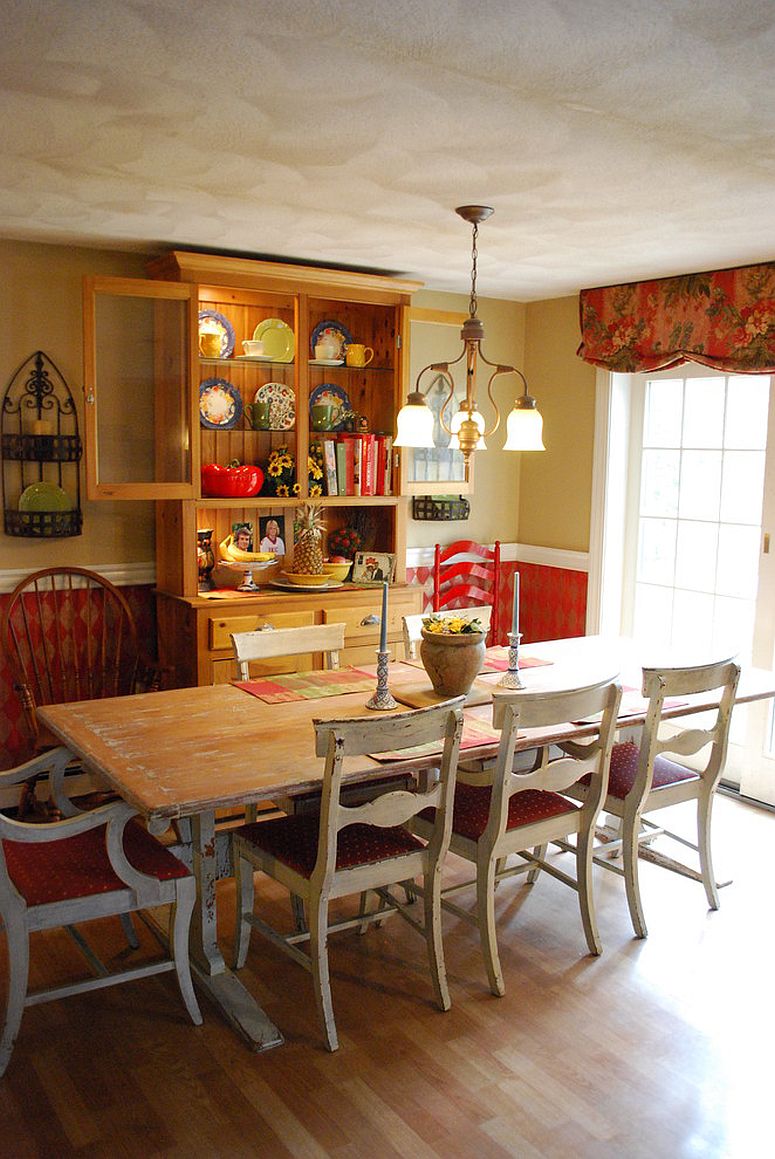 Gorgeous hutch creates a cool and colorful backdrop in this farmhouse style dining space [From: Michelle Jamieson Interiors / New England Style]