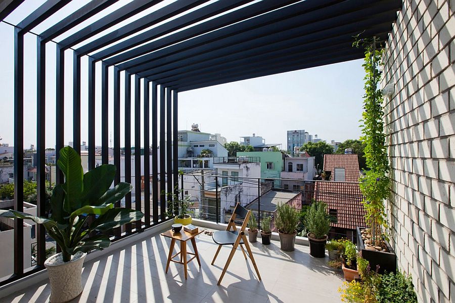Gorgeous balcony of Saigon home with a dash of greeney and lovely views