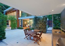 Gorgeous-barbeque-and-sitting-zone-draped-in-greenery-217x155