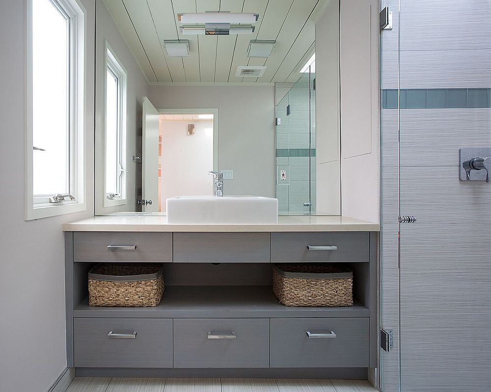 Gray bathroom vanity with ample storage