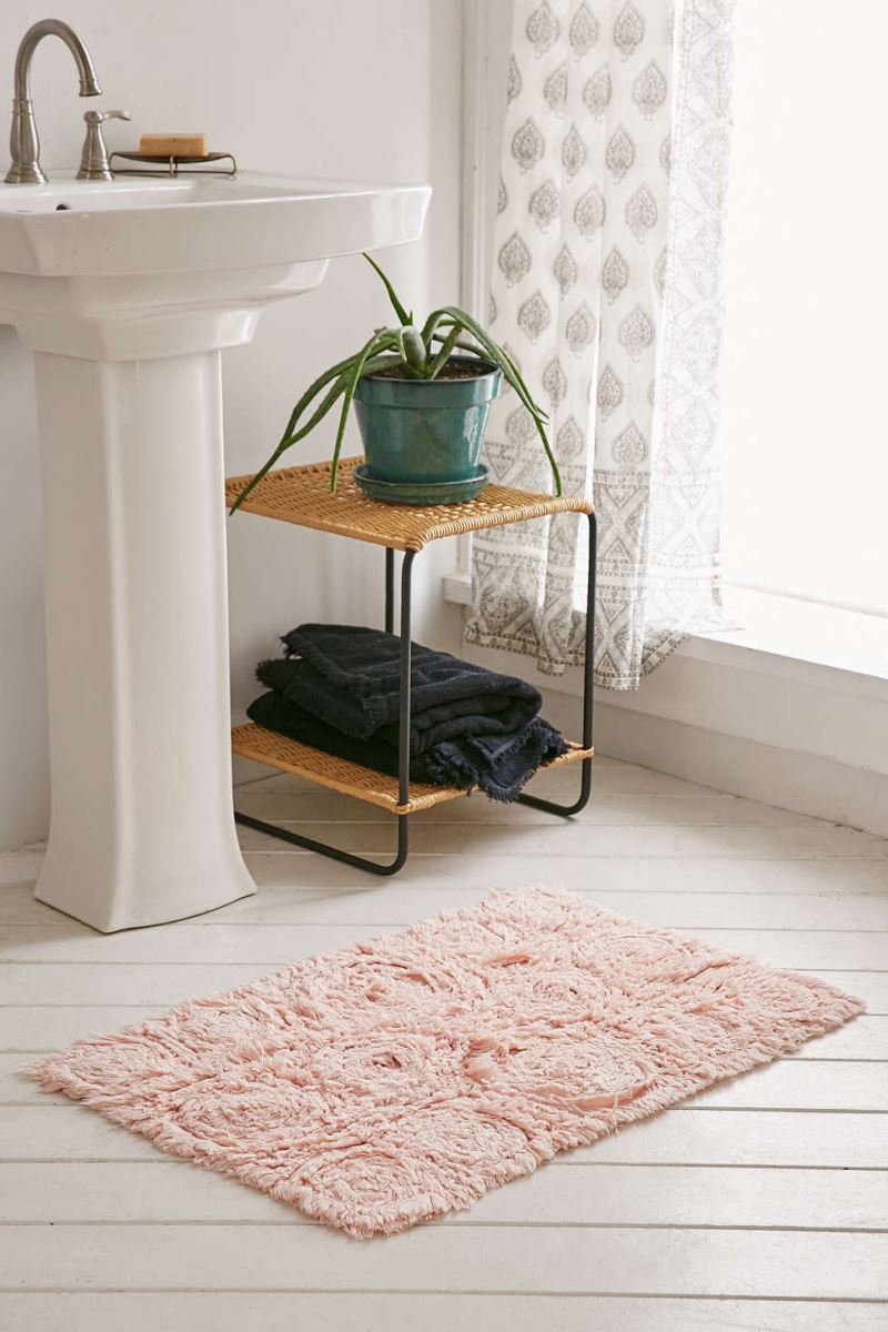 Hint of pink in a white bathroom