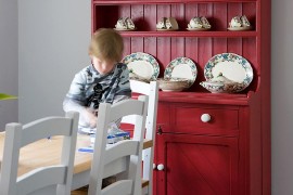 Hutch in bright red adds color and class to the transitional kitchen 270x180 Organizational Delight: 30 Smart Dining Room Hutches and China Cabinets