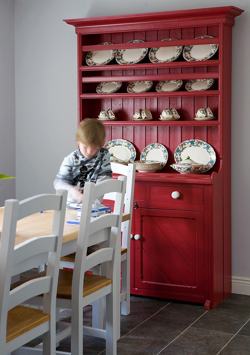 Hutch in bright red adds color and class to the transitional kitchen