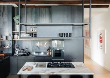 Industrial-modern-kitchen-with-exposed-wooden-beams-and-gray-cabinets-217x155