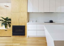 Kitchen-cabinetry-and-living-room-shelves-delineate-one-space-from-the-next-217x155