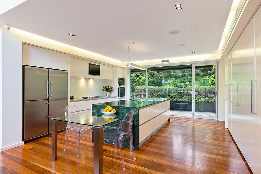 Kitchen with breakfast zone that features acrylic chairs