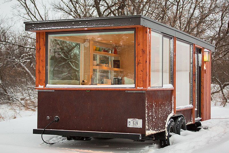 Large windows of the tiny home ensure that you are always connecetd with the landscape outside