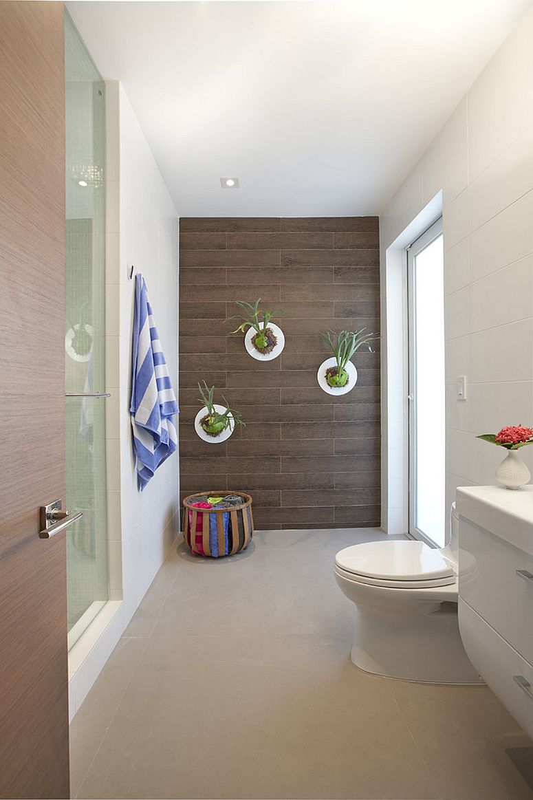 Light-filled modern bathroom is perfect for indoor plants [Design: DKOR Interiors]