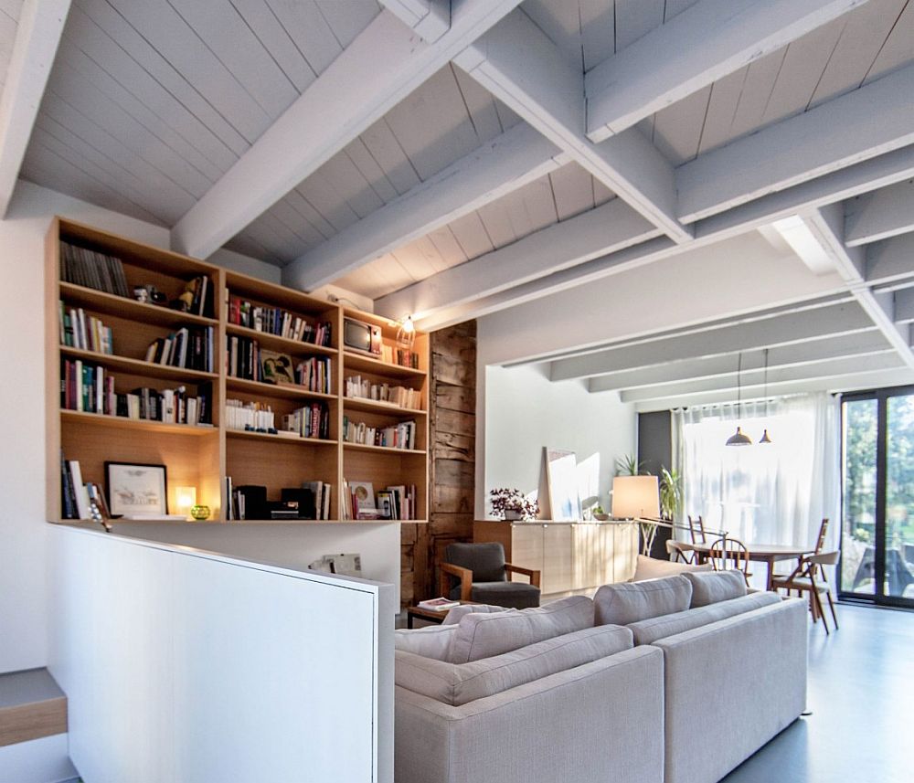 Living area of the duplex home draped in neutral hues