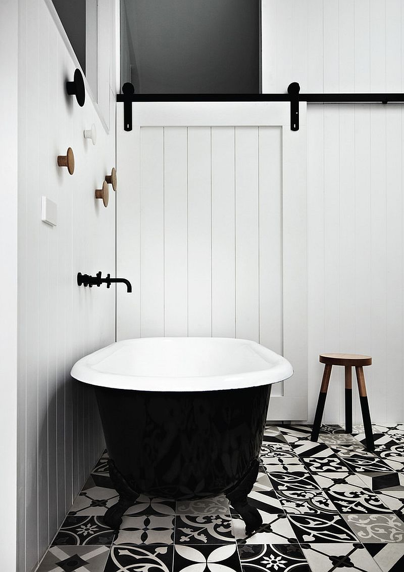 Lovely use of mismatched black and white floor tiles in the bathroom