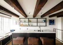 Marble-kitchen-island-and-leather-bar-stools-add-a-hint-of-luxury-to-the-setting-217x155