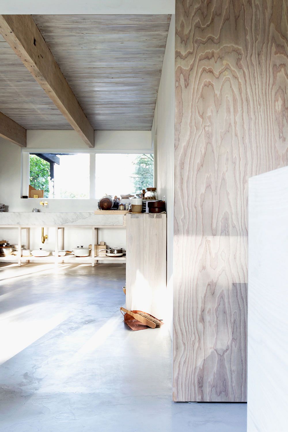 Marble kitchen workstation adds contrast to the interior