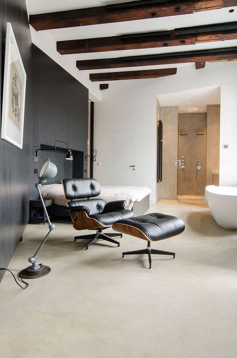 Master bedroom and bath with floor lamp and Eames Lounger