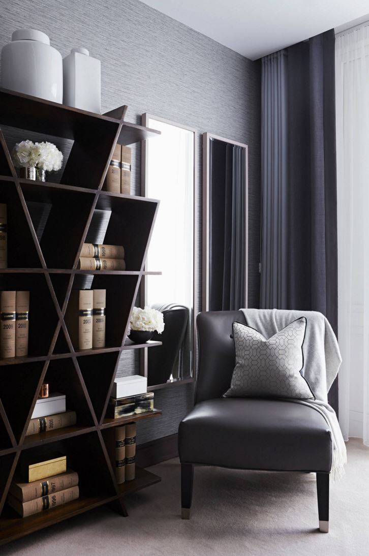 Matching books on a beautifully styled shelf