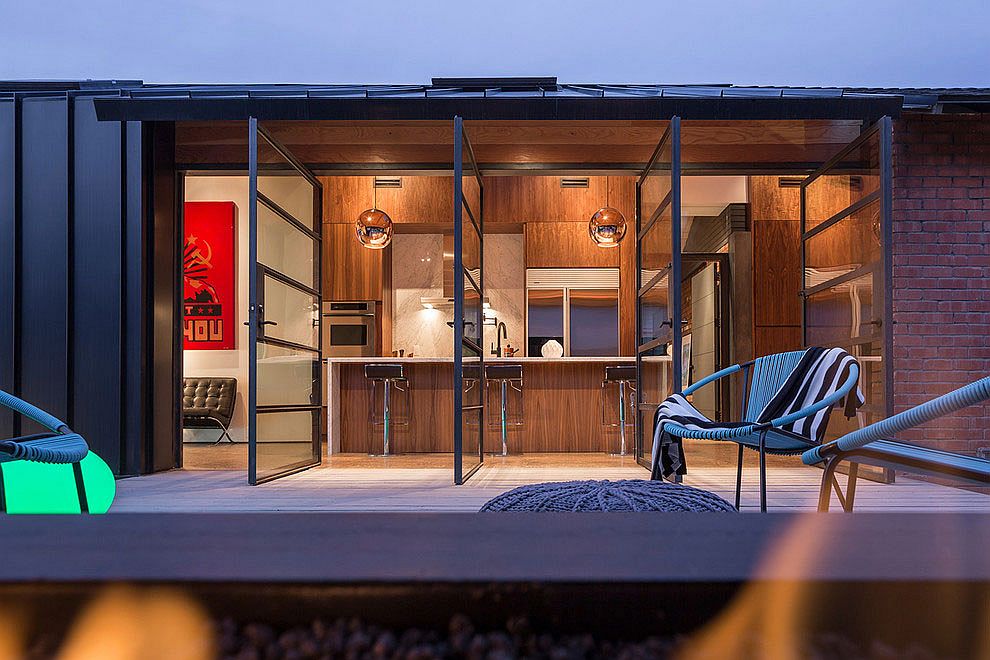 Metallic pendants add to the appeal of the kitchen