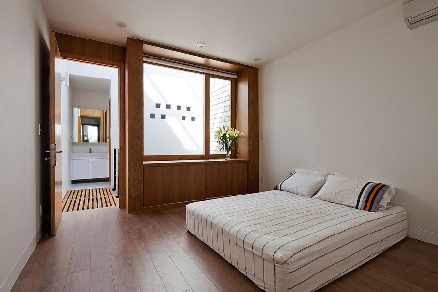 Minimal modern bedroom with warmth of wood