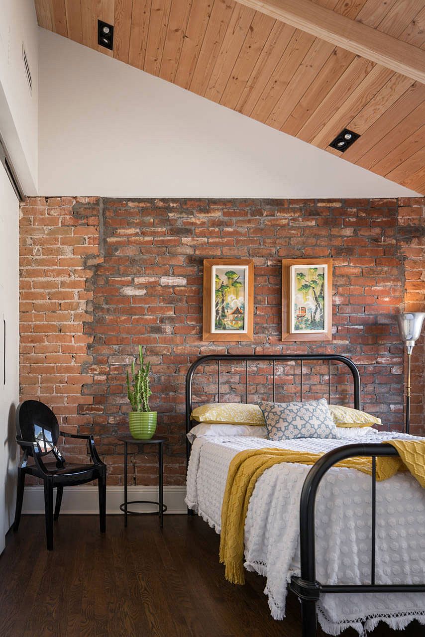 Modern rustic bedroom with exposed brick wall