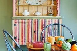 Multi colored dining room hutch becomes a vivacious focal point in the dining room 270x180 Organizational Delight: 30 Smart Dining Room Hutches and China Cabinets