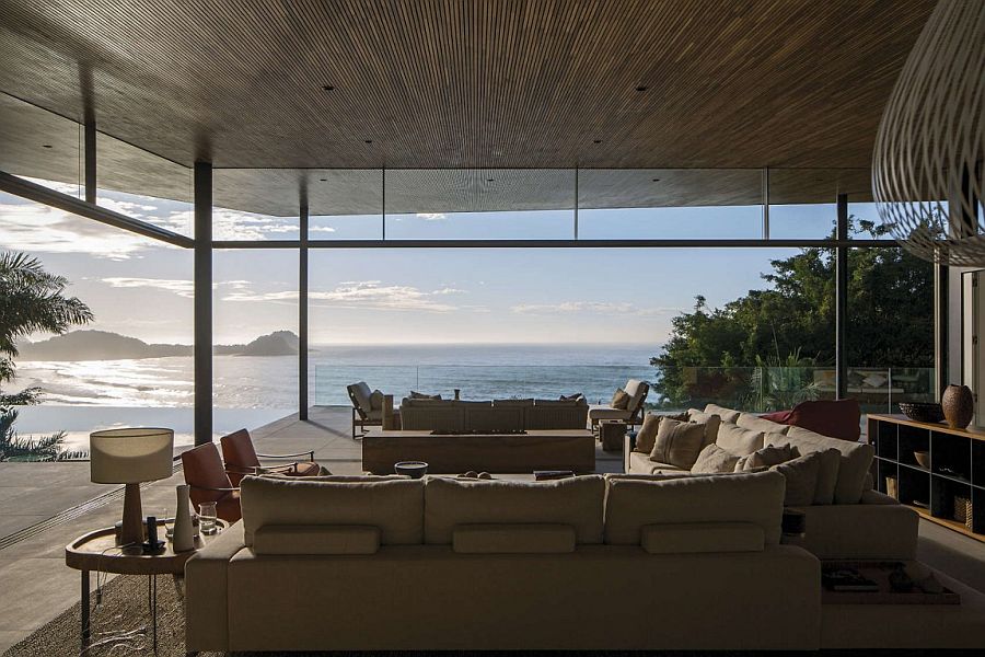 Open pavillion of the oceanside retreat in Guarujá with mesmerizing views