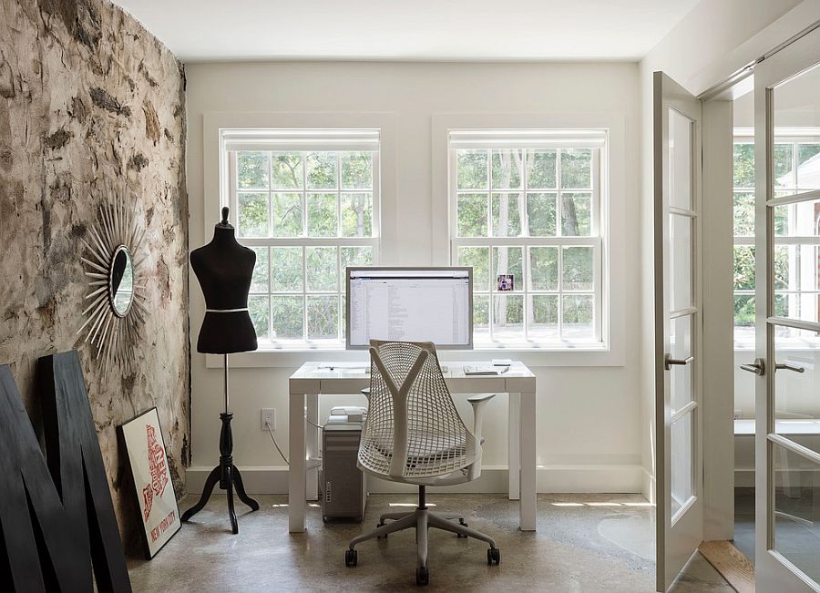 Original stone wall foundation becomes a smart accent feature in the revamped home office