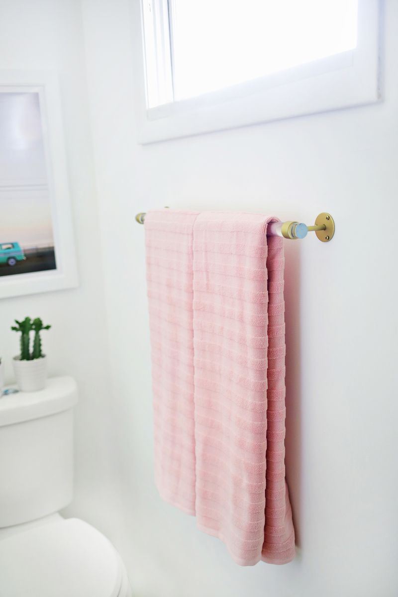Pink towels in a crisp modern bathroom