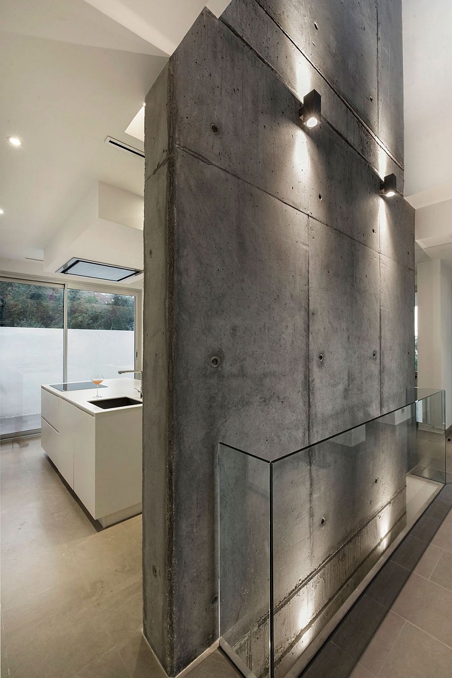 Raw concrete becomes an important part of the home's design