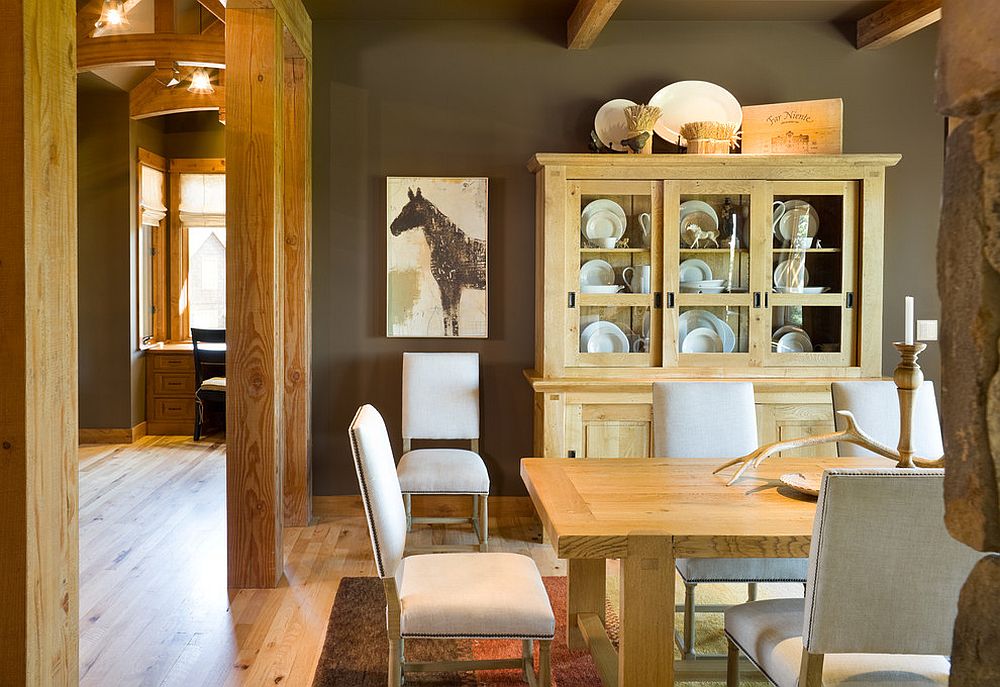 Rustic dining room with a fabulous china hutch that complements its style perfectly