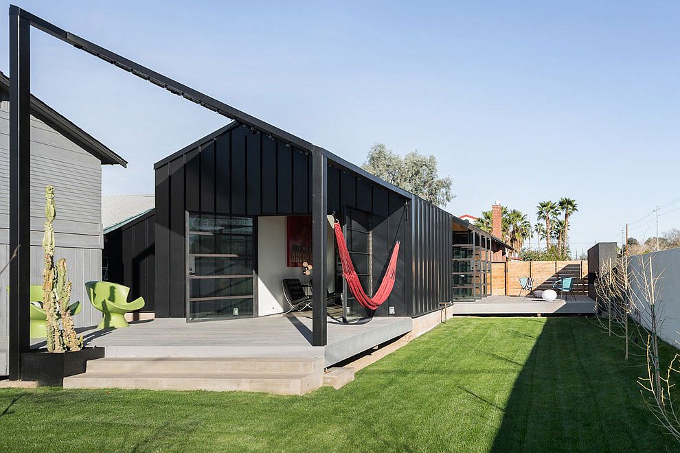 Shipping container styled extension in the rear of Arizona home