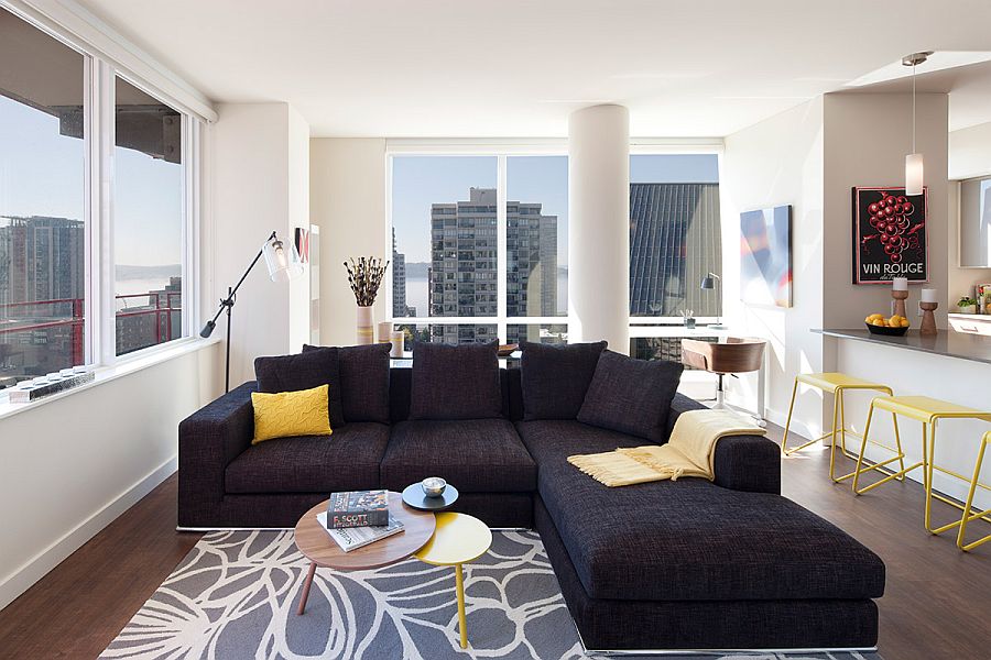 Simple living area with a cozy sectional and gorgeous views outside the window