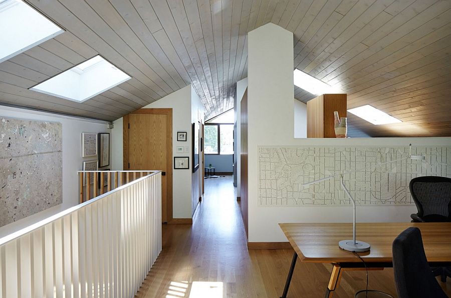 Skylights on the top level illuminate the walkways and home office