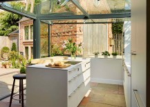 Sliding-glass-doors-open-up-the-kitchen-to-the-garden-217x155